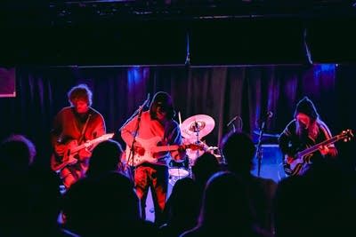 Lutalo performing on stage