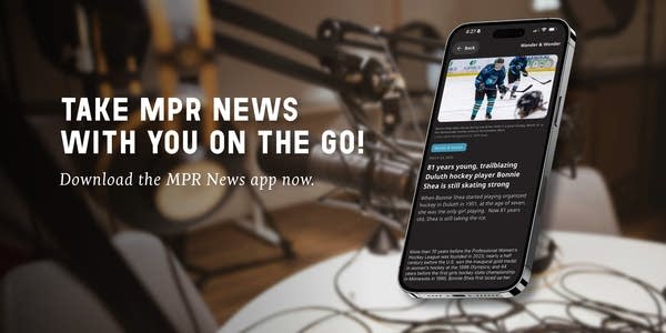 An article shows on the MPR News app on a cell phone screen.