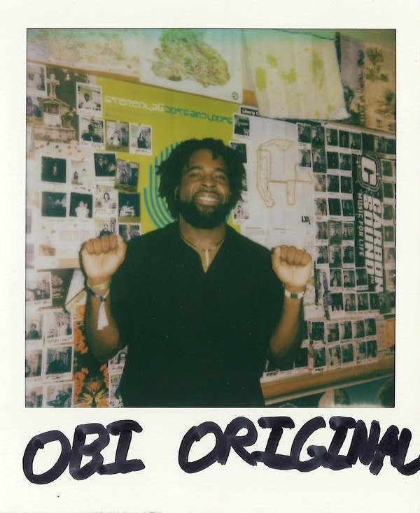 a signed polaroid with a man in it