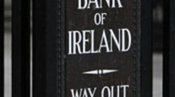 A man leaves the Bank of Ireland in Dublin. Ireland admitted Monday it is in contact with 'international colleagues' over its debt crisis but denied seeking a bailout.