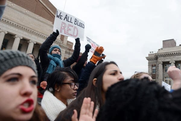 Protesters chant "hands up don't shoot."