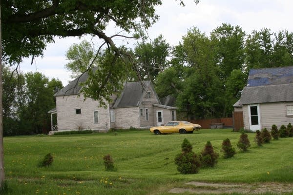 delhi-yellow-car-in-yard