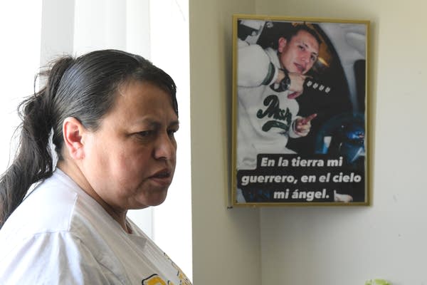 woman profile with photo of son
