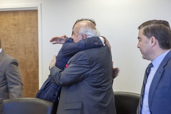 Robert Murray of Murray Energy, right, hugs Energy Secretary Rick Perry.
