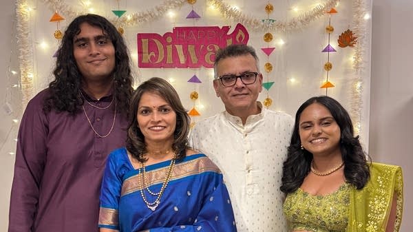 Kirti (center left) and Vijay (center right) Desai with their children. Family history has been at the forefront of Kirti and Vijay's retirement.
