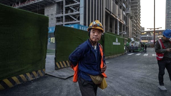 China's economy shows signs of trouble as unemployment rises to 5.2% and retail sales grow just 0.6% year on year; Li Qiang warns of insufficient domestic demand