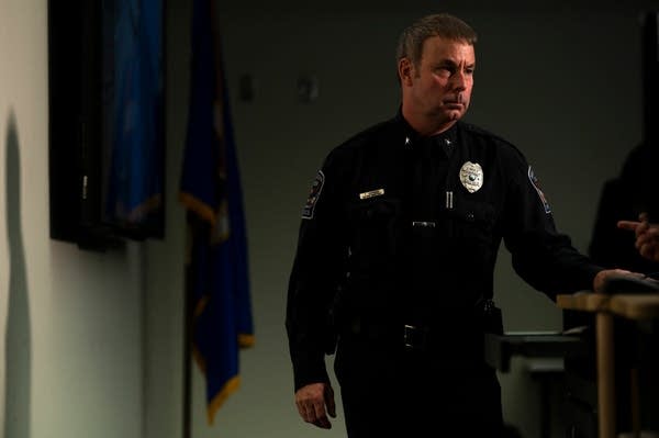 Brooklyn Center Police Chief Tim Gannon looks on during a press conference.