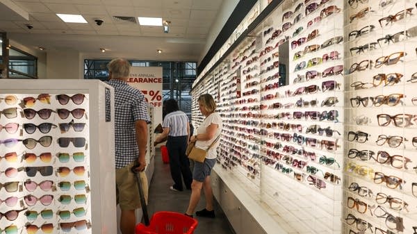 The July retail sales report showed an uptick in spending on clothes and other small luxuries, even as consumers pulled back on larger purchases, like restaurant meals.