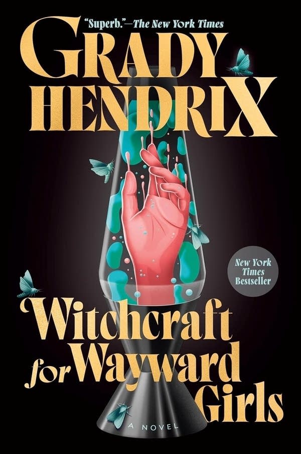 The cover of a novel shows a hand inside a lava lamp.
