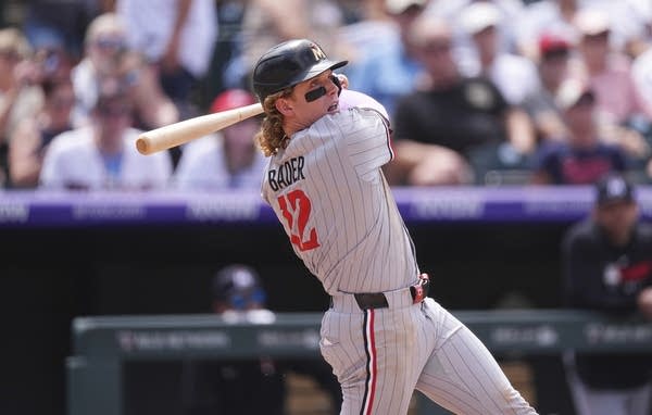 Lewis hits 2 homers and Ryan strikes out 11 as Twins top Rockies to avert series sweep