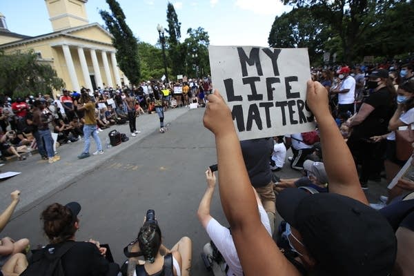 Demonstrators protest near the White House.