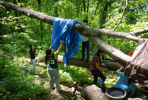 Students building a shelter 