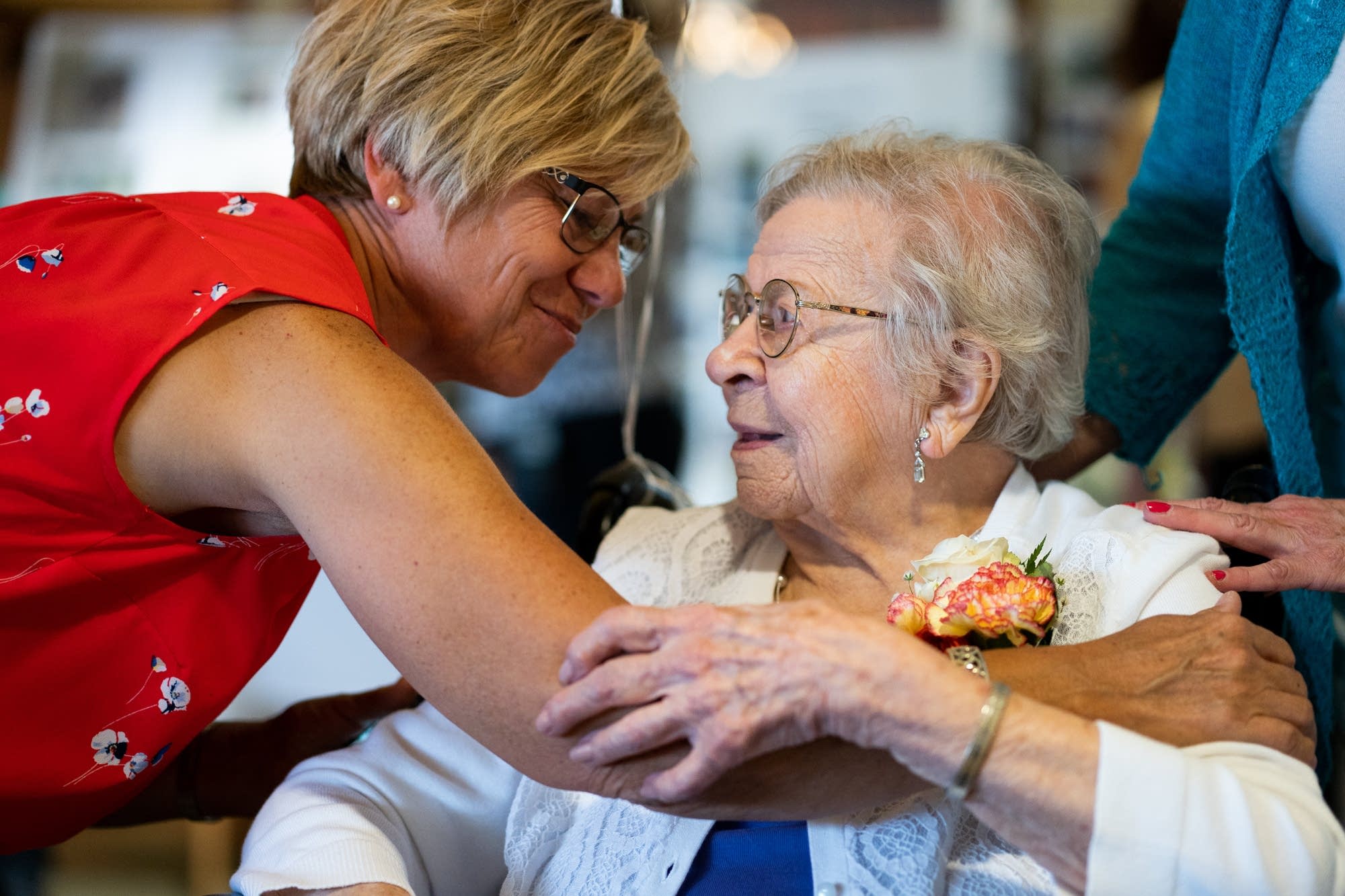 Evelyn Kleine greets Alison Ecklund, her great niece-in-law.