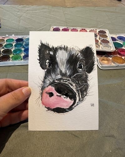 A watercolor portrait of a pig