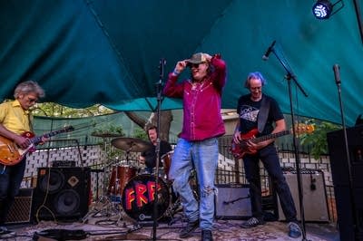 The Customers performing on stage