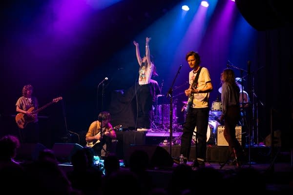 a band performing on stage