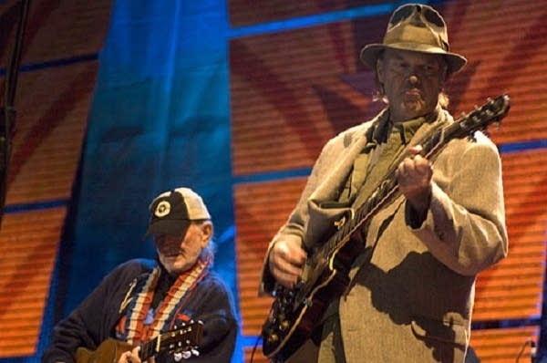 Farm Aid co-founders Willie Nelson (left) and Neil Young perform at the series' 21st annual concert in Camden, N.J.