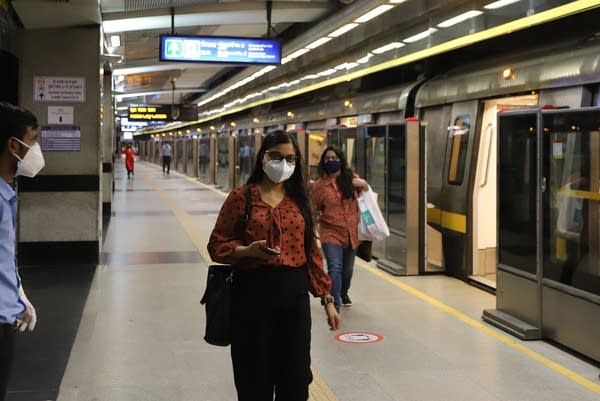 Delhi metro trains restart operations after being suspended for over five months due to the  coronavirus pandemic. 