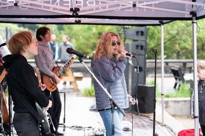 the band blondshell performing outdoors at a brewery