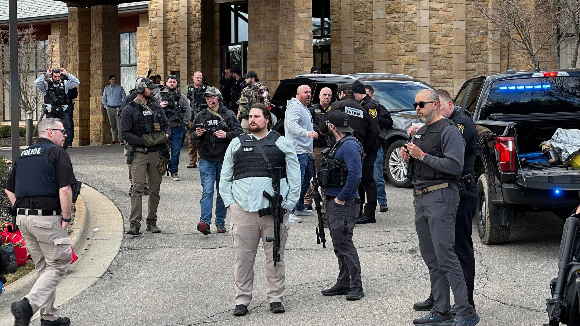 Armed man rammed car into Mich. synagogue, fatally shot