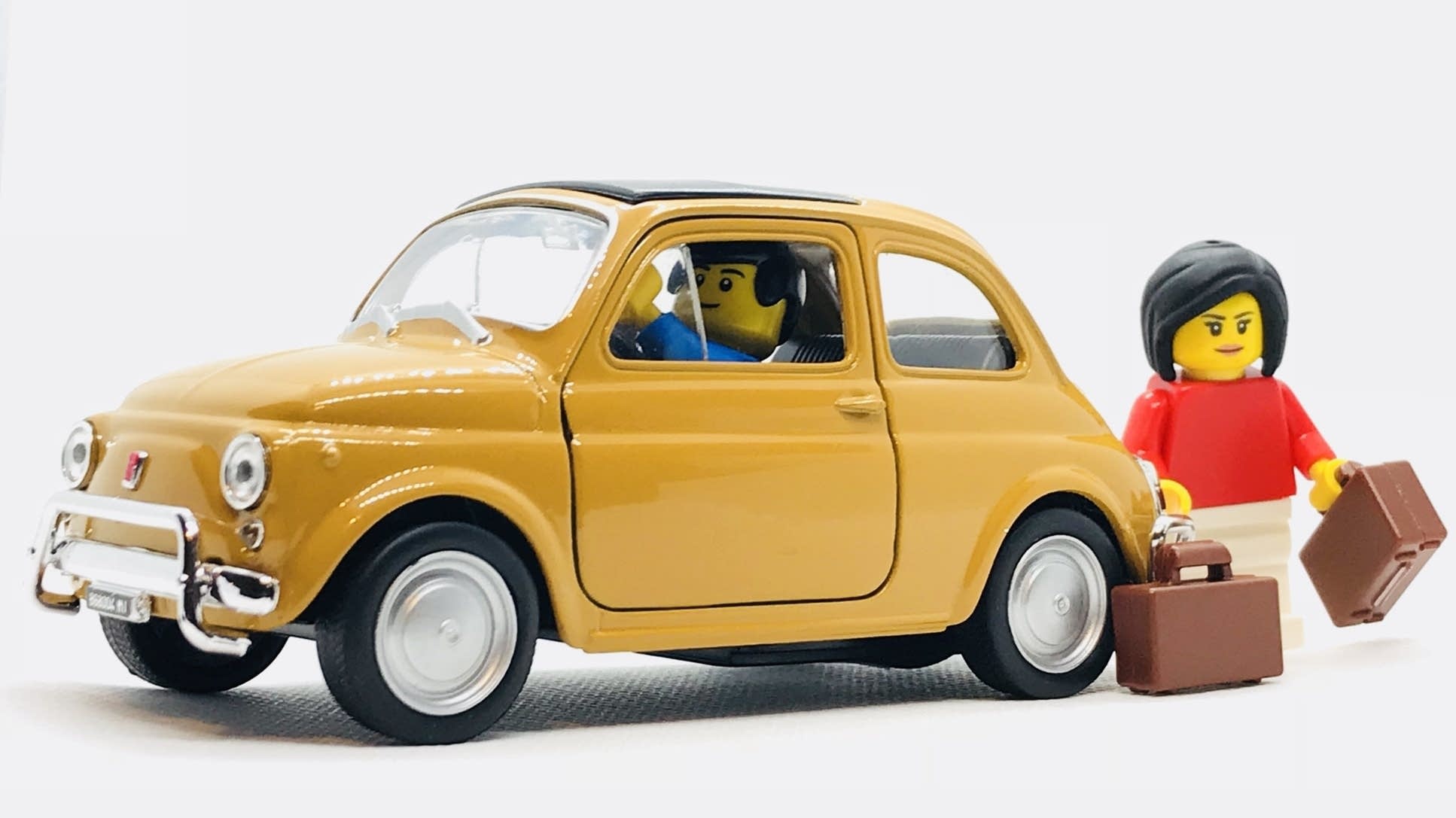 MIniature car and figurines.