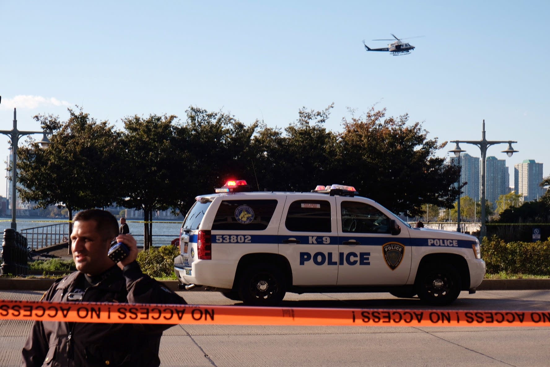 Police gather at the scene after reports of multiple people injured