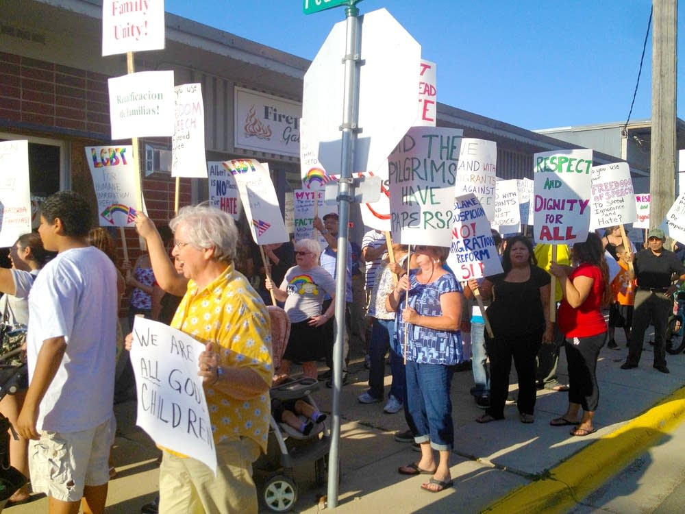 Protest over immigration sign