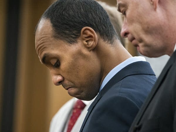 Mohamed Noor reads a statement at Hennepin County District Court