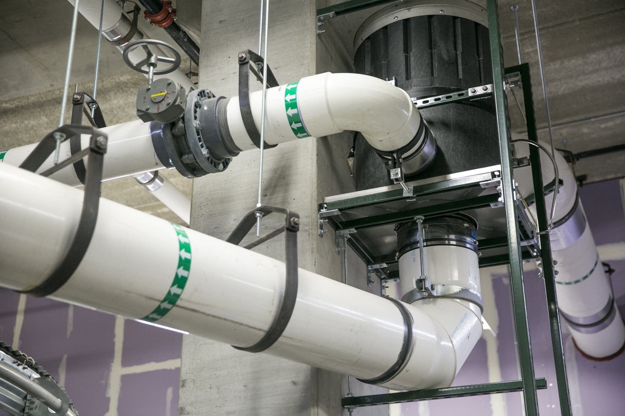 Three pipes connect to a vortex filter