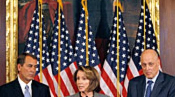 House Speaker Nancy Pelosi of California announces the proposed economic stimulus package worked out between the Bush administration and the House today as House Minority Leader John Boehner of Ohio, left, and U.S. Treasury Secretary Henry Paulson look on.
