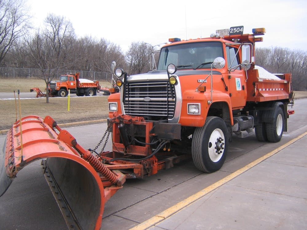 Snow plows wait for storm