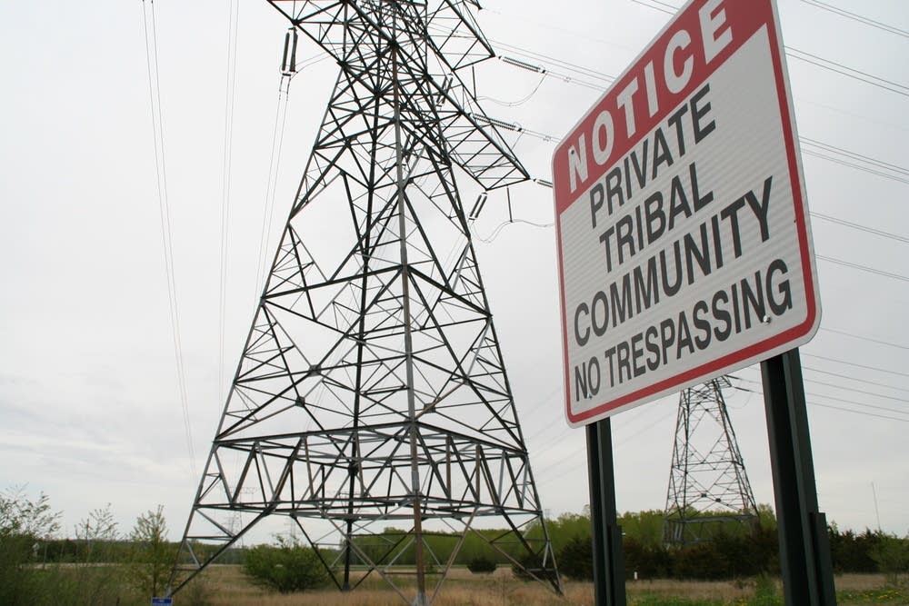 The tribal community sits very close to the plant