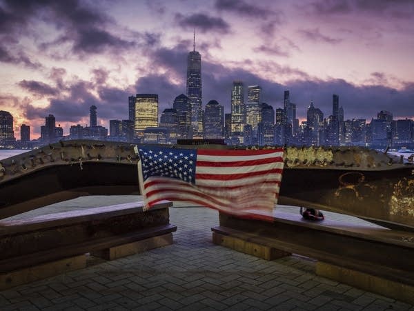 A U.S. Flag hanging from a steal girder