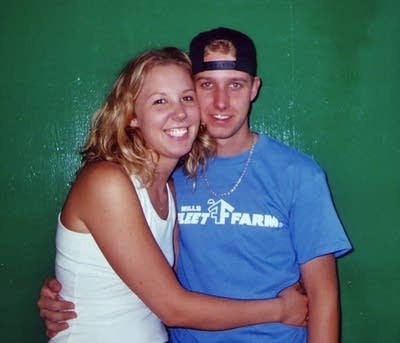 A young couple poses for a photo