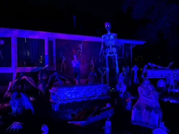 A skeleton in a yard