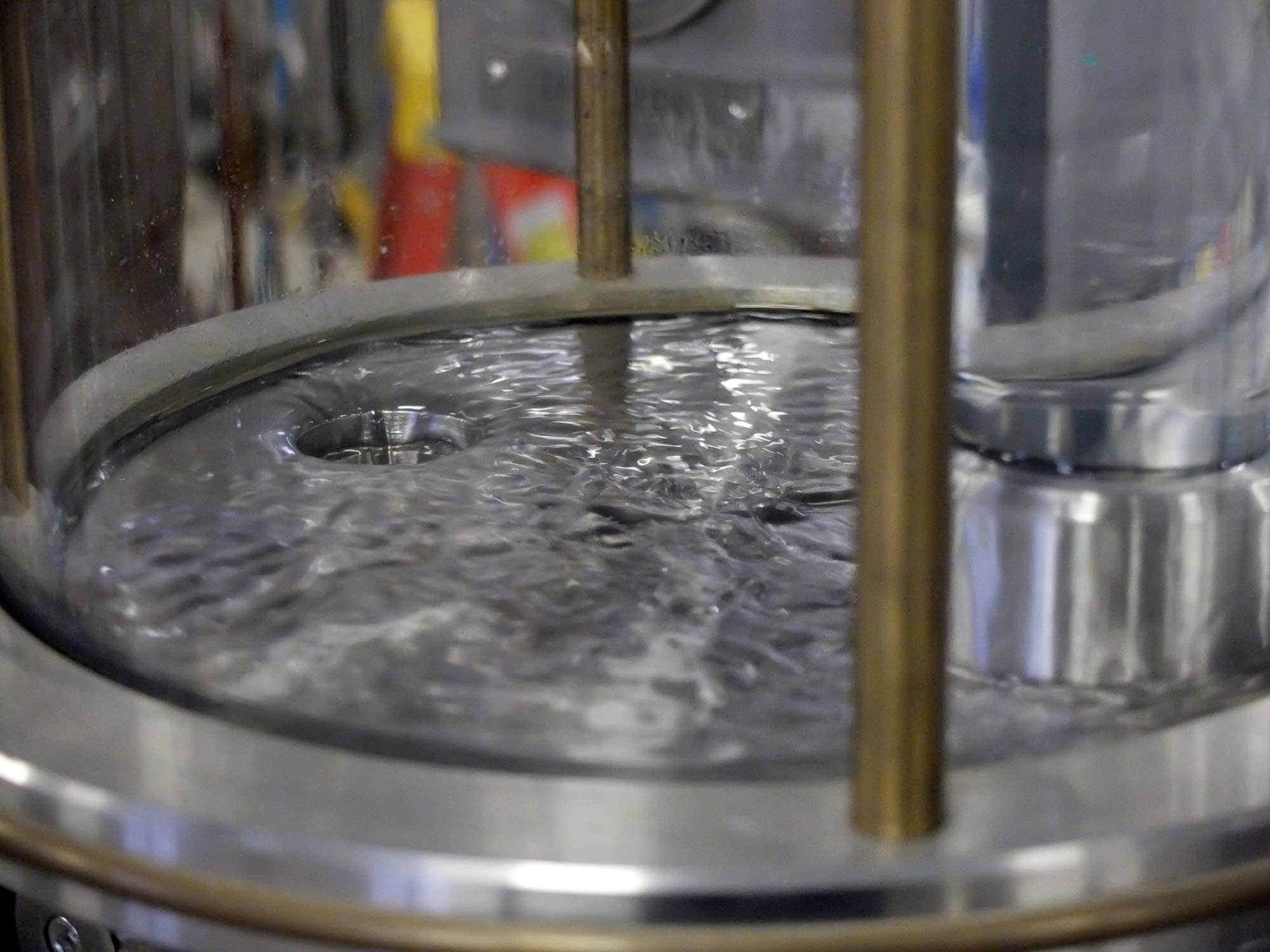 Distillate flows from a still at Far North Spirits.