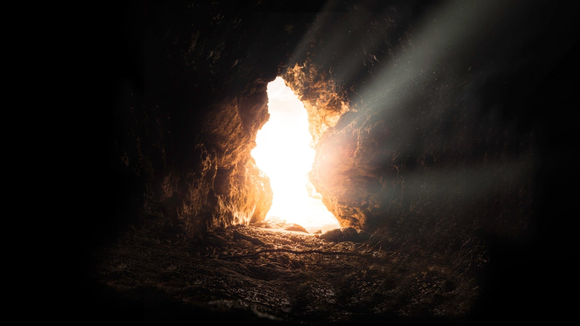 Sunlight shining through cave opening