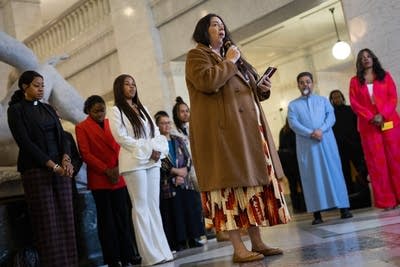 A woman recites a land acknowledgement