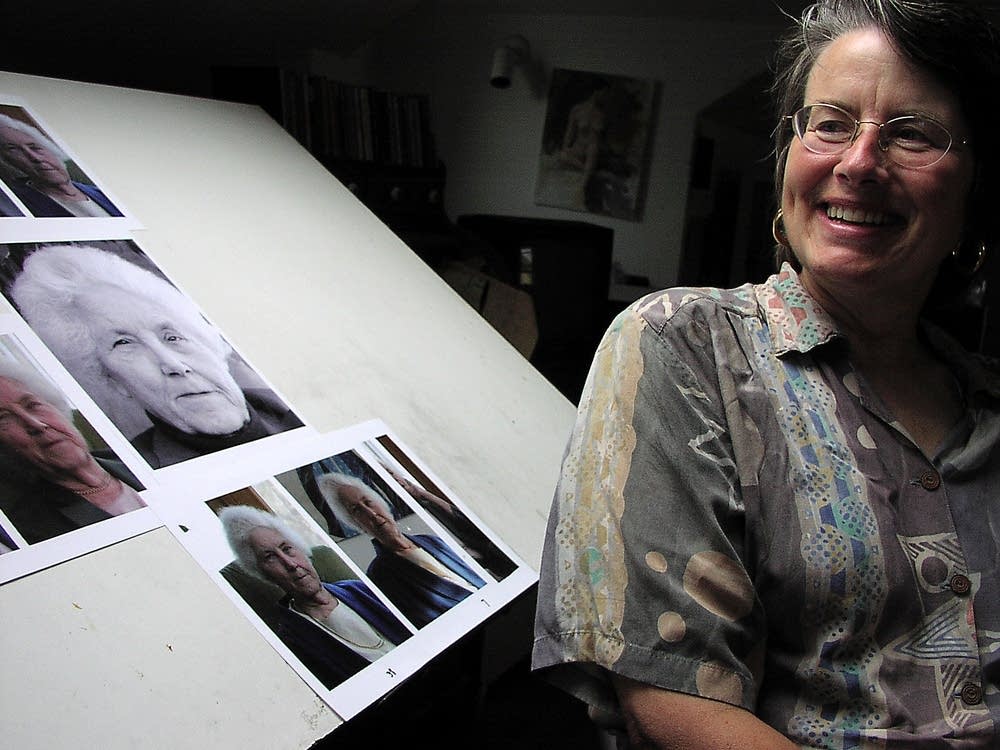 Leslie Bowman, with photos of her subject
