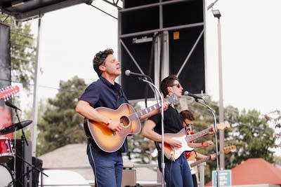 Two men performing on stage