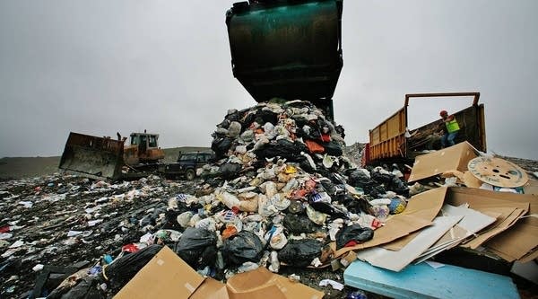 A truck empties its load of waste at the Shelford Landfill, Recycling & Composting Centre.