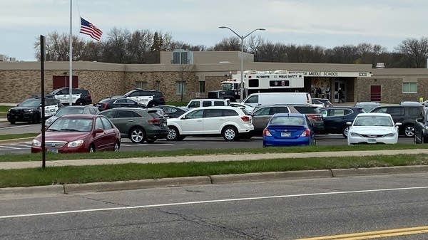 A view of a parking lot outside of the school building.