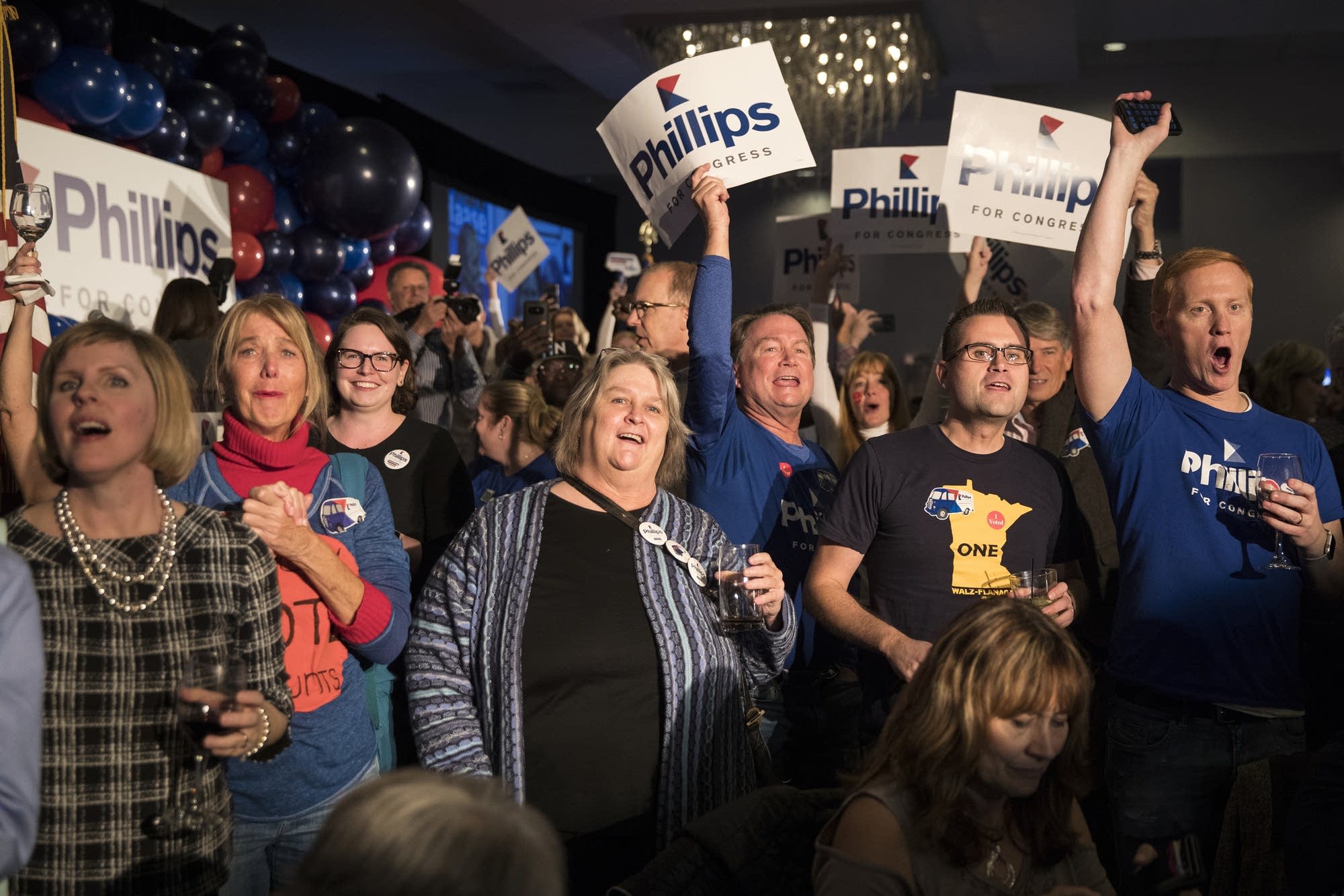 Phillips' supporters cheer his win.