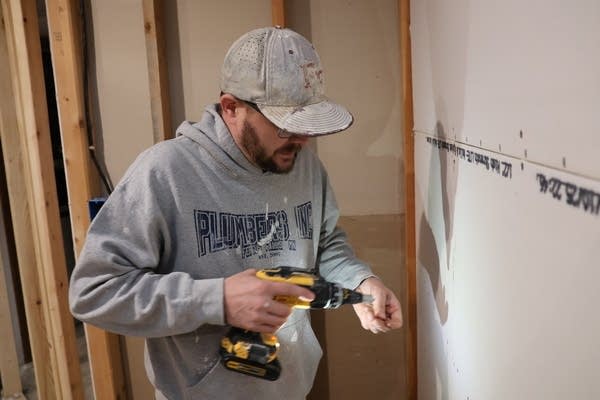 Man using drill