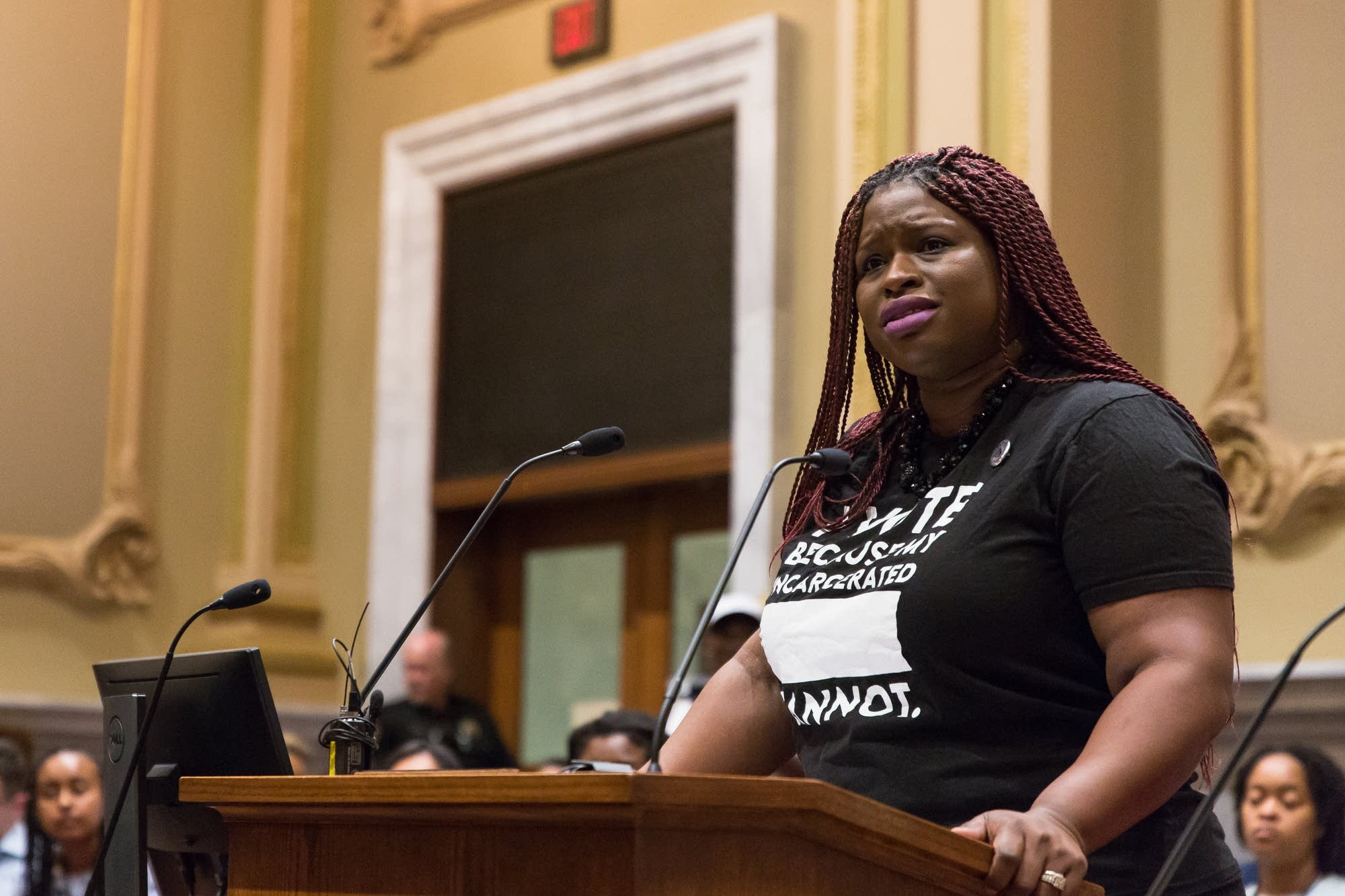 Nekima Levy-Pounds speaks to the panel of committee members.