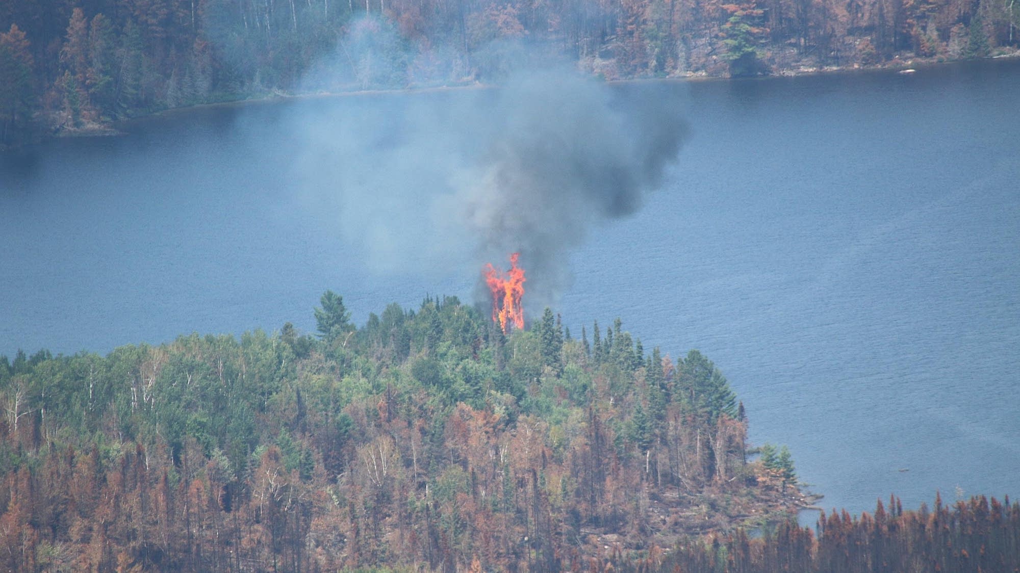 Rain helps contain wildfires so more of the BWCA will reopen, but fires burn on