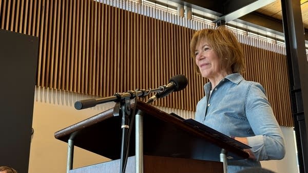 U.S. Senator Tina Smith speaks at a podium