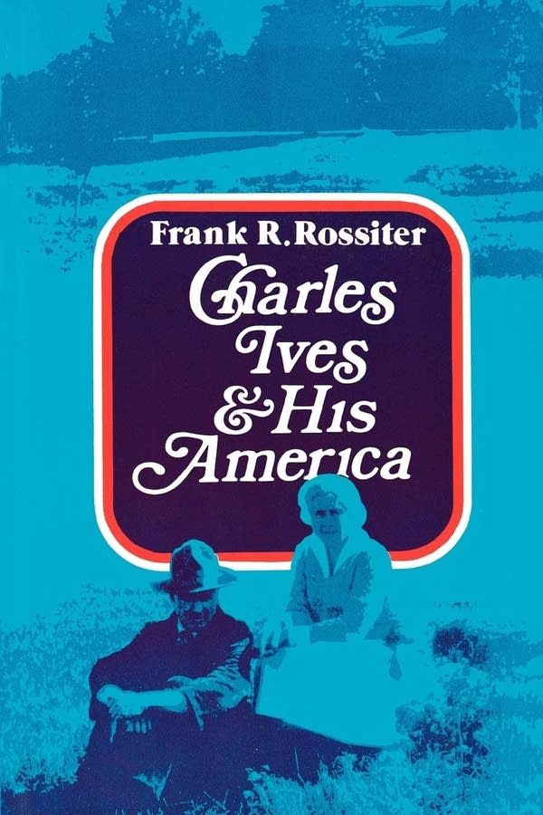 Book cover with a photo of two people sitting on a hillside