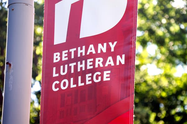 A maroon banner on a light pole reads "Bethany Lutheran College."