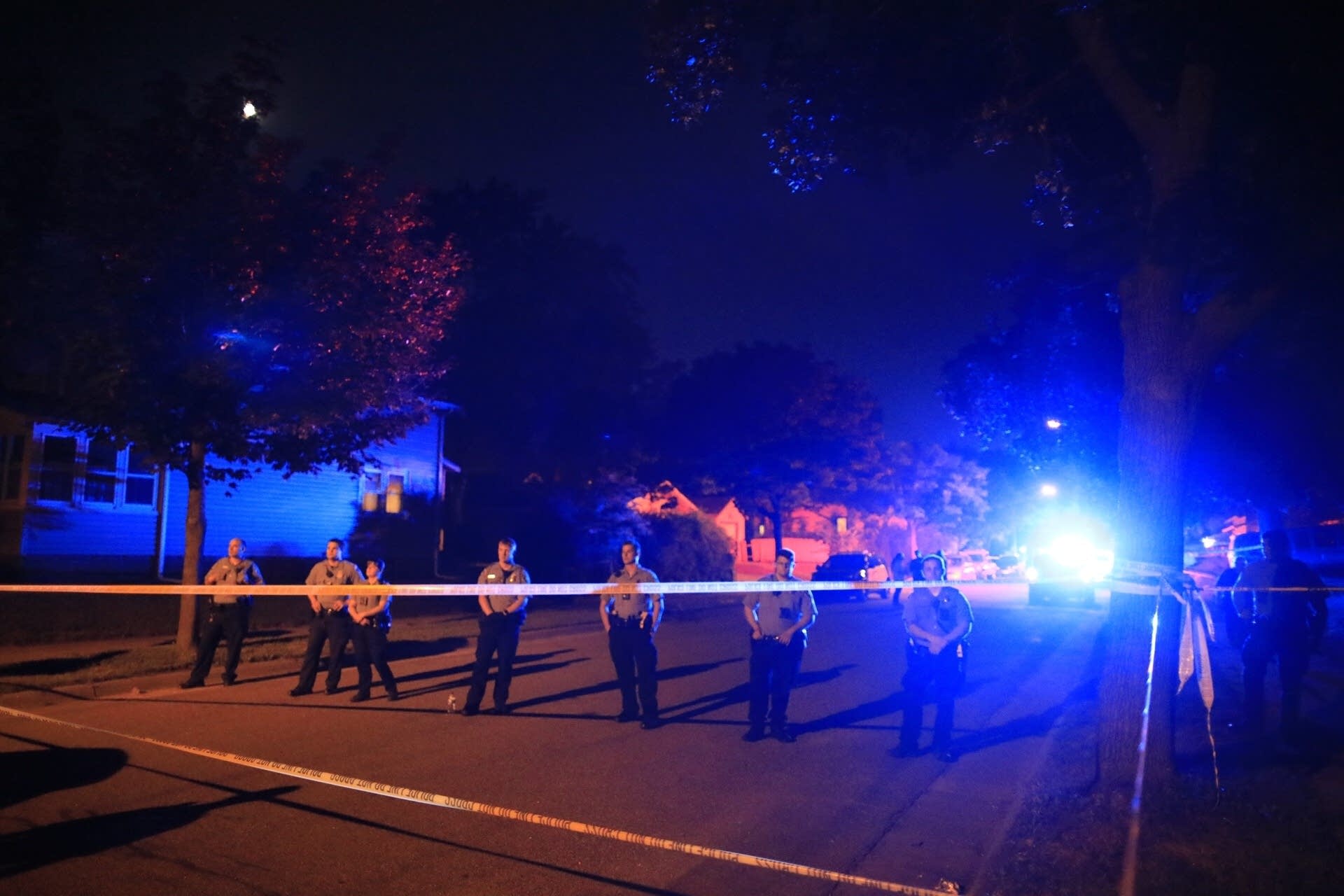 Police guard the scene near the corner of 48th Avenue North and Camden Ave.